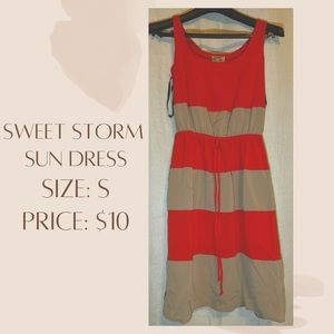Pink and tan sundress that’s perfect for the summer.